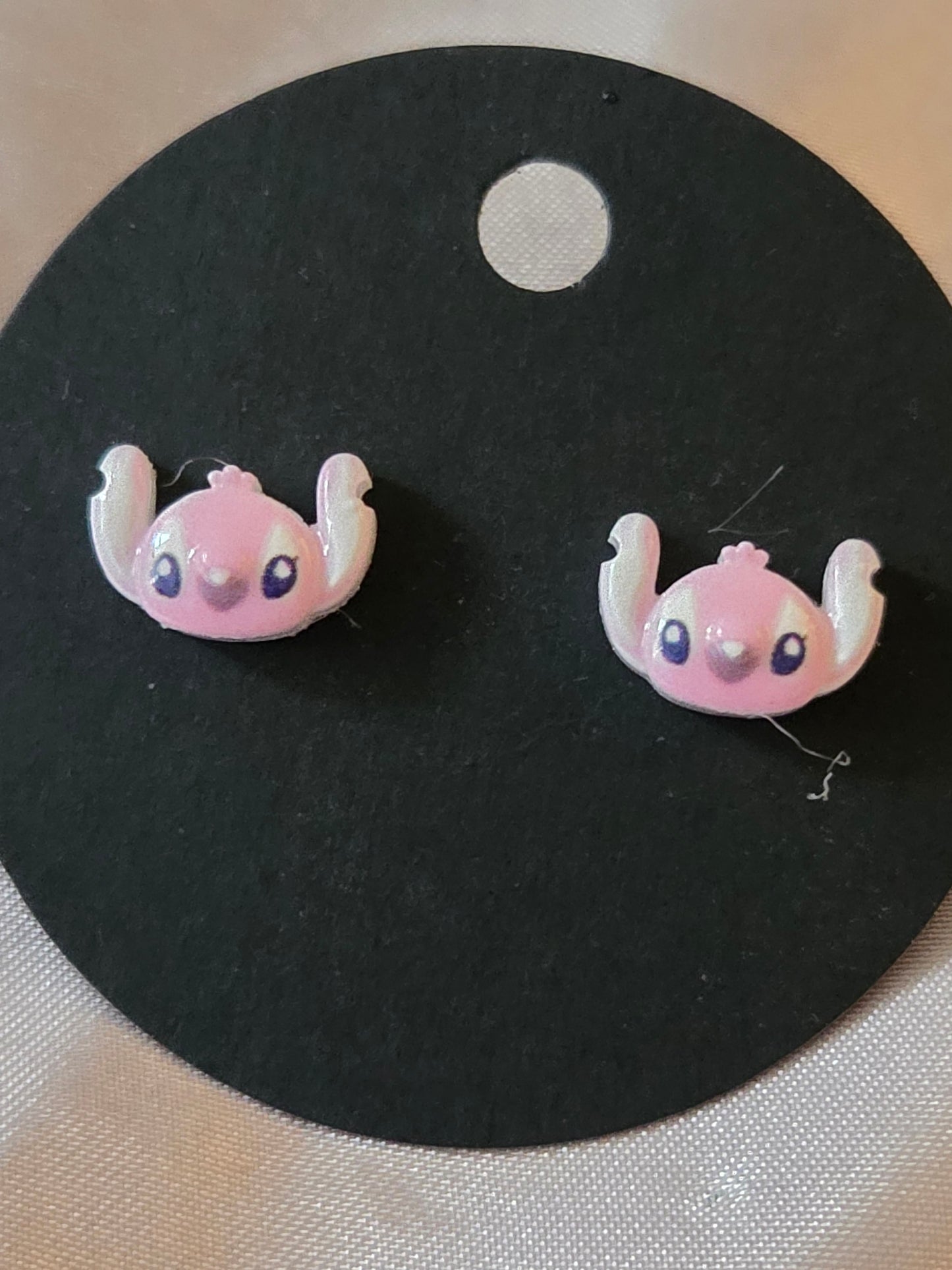 Female stitch earrings