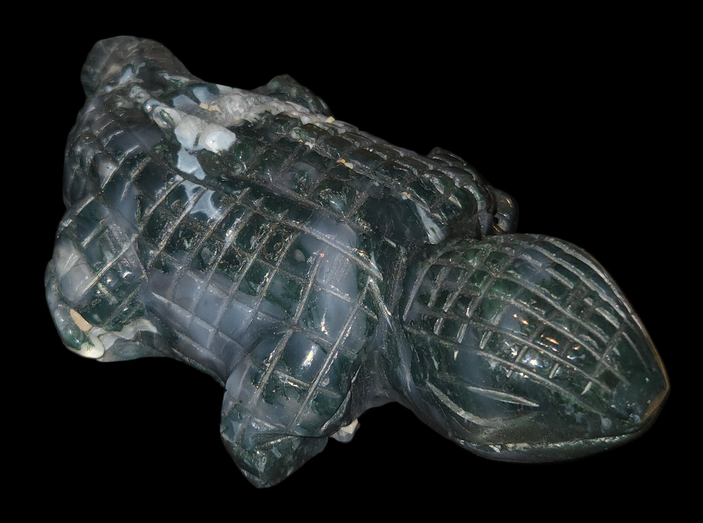 Moss agate lizard carving