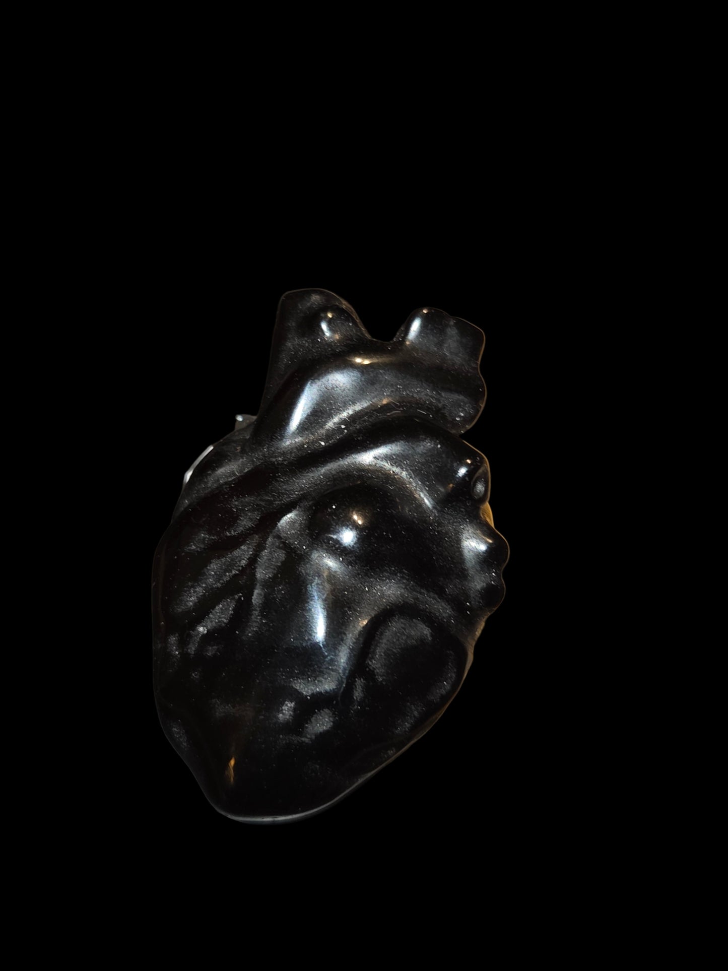 Obsidian human heart carving