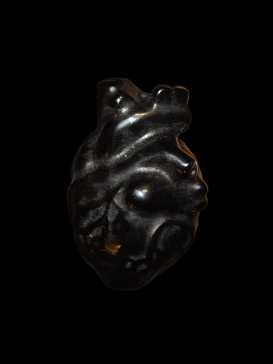 Obsidian human heart carving