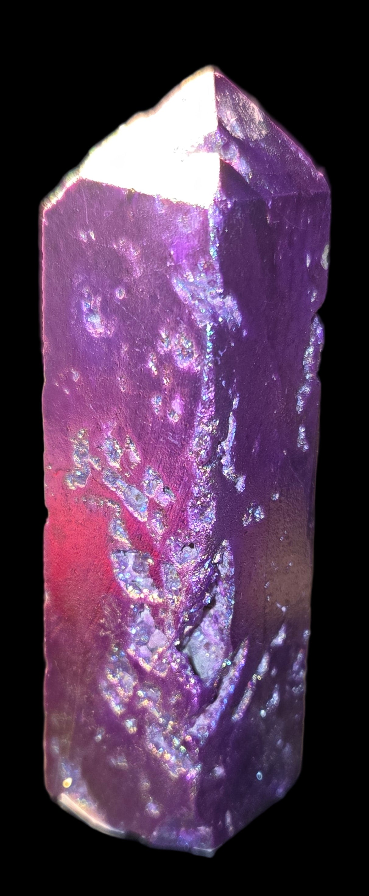 Purple aura quartz crystal