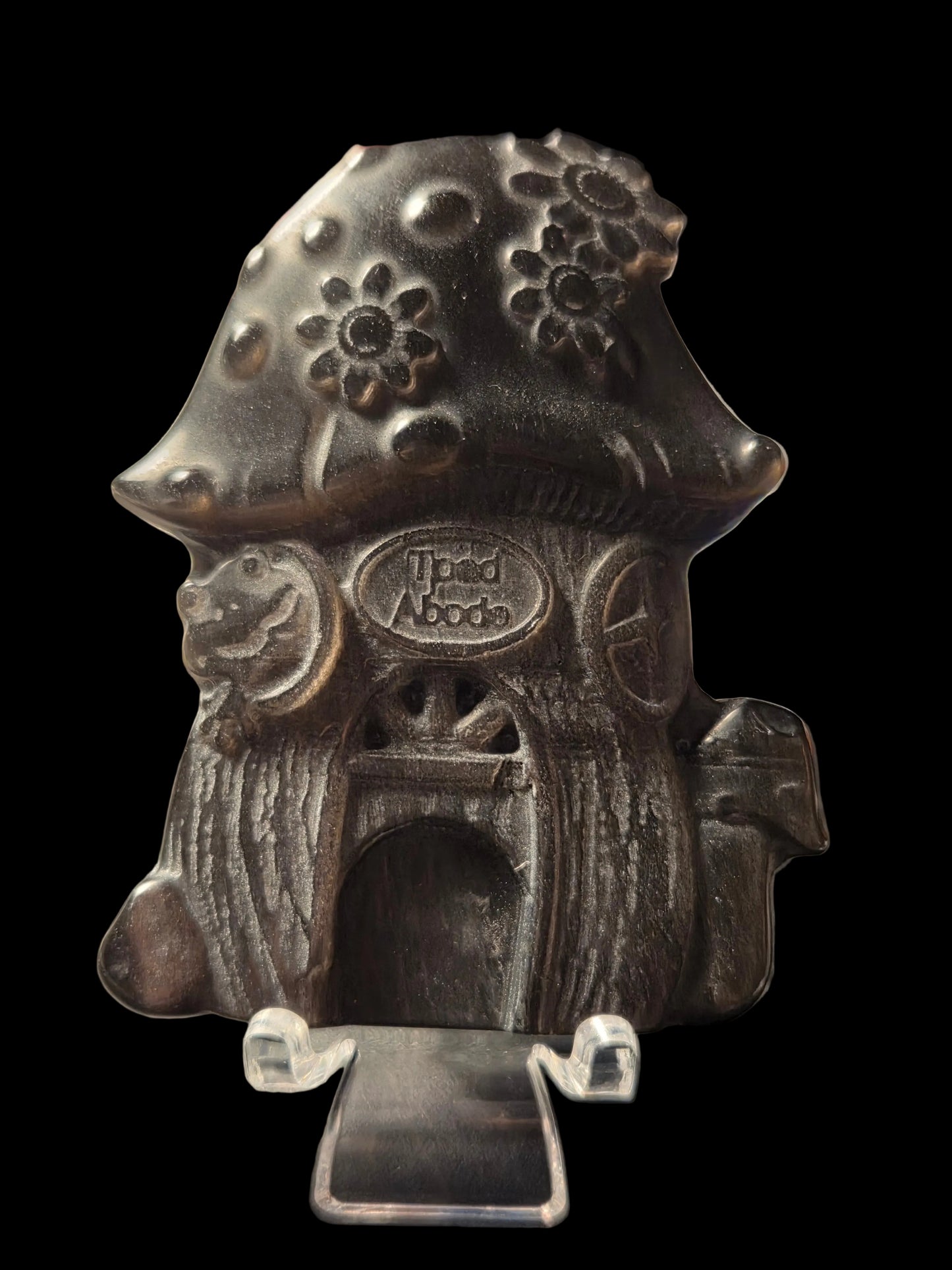 Silver obsidian toad house carving